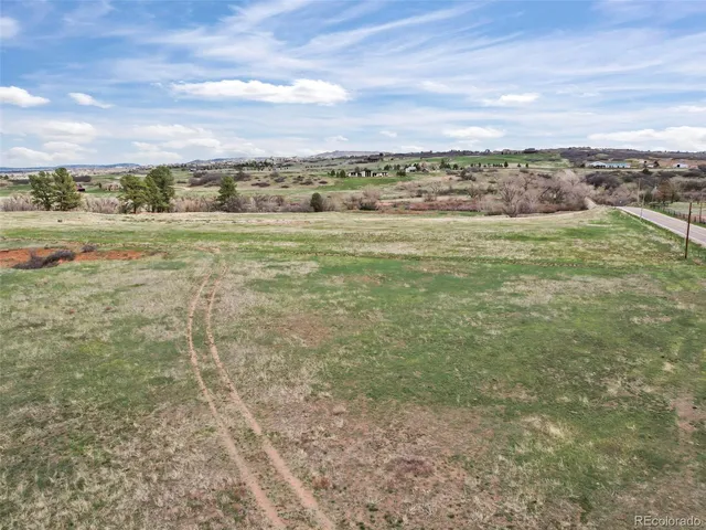 a view of a city with an ocean beach