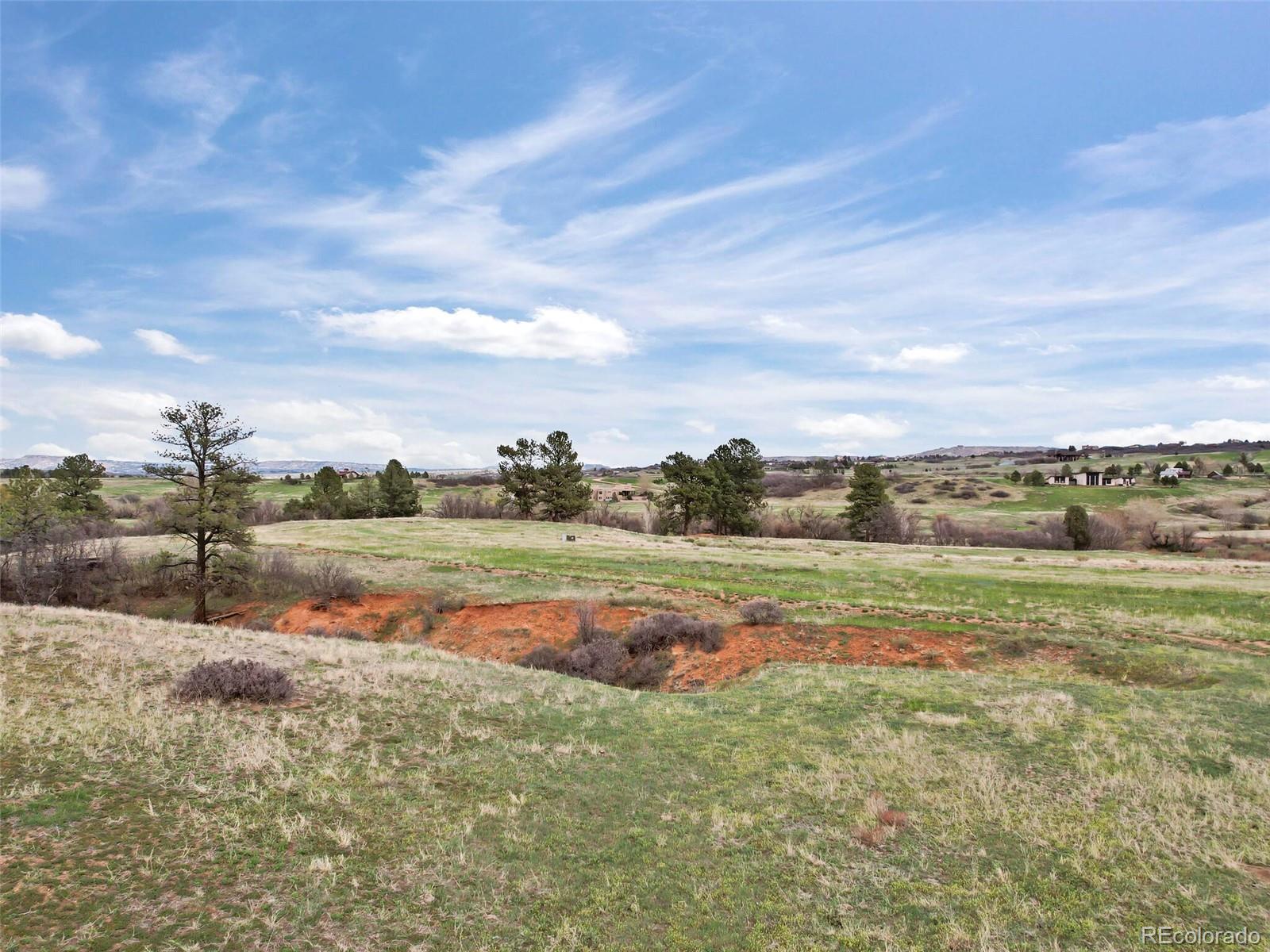 4771 Jackson Creek Road Sedalia, CO 80135 - Photo 18 of 19 a view of a lake view