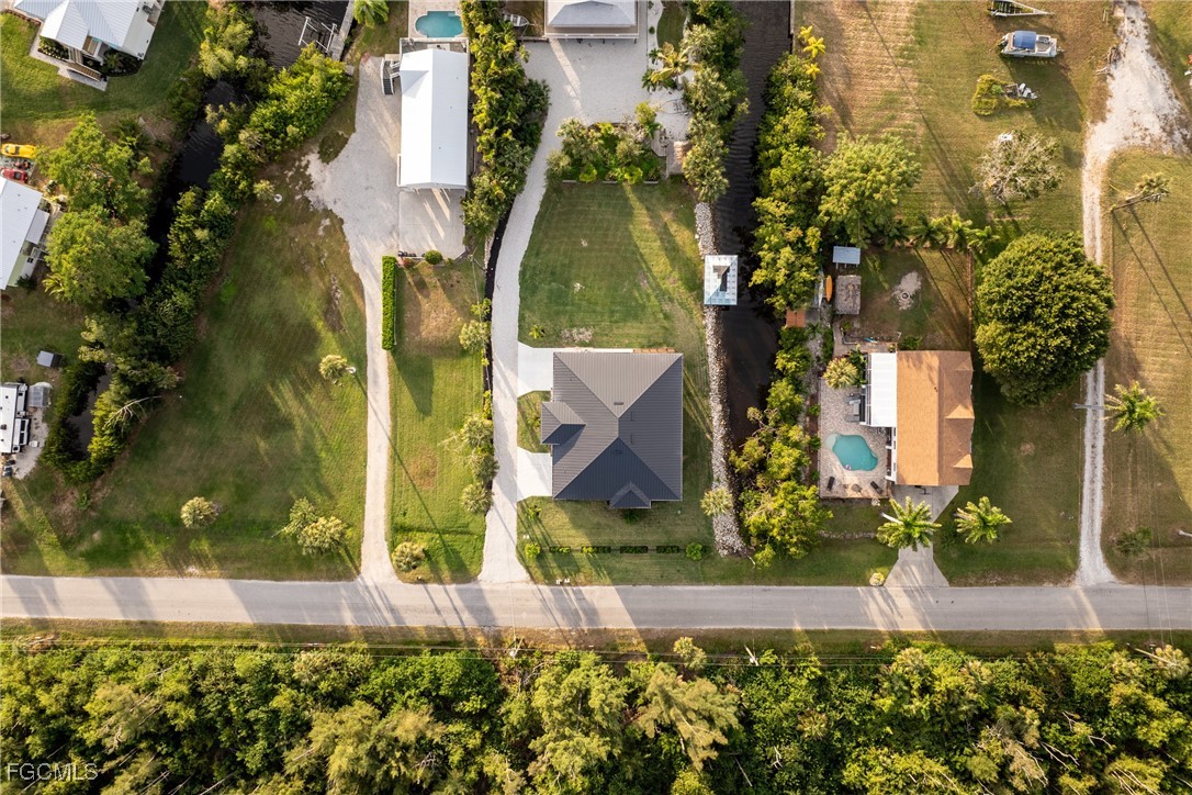 18190 Pioneer Road Fort Myers, FL 33908 - Photo 45 of 45 front view of a house with a yard