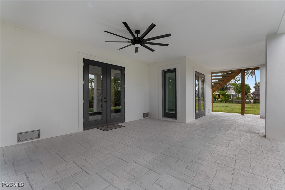 18190 Pioneer Road Fort Myers, FL 33908 - Photo 10 of 45 a view of a livingroom with a ceiling fan and window