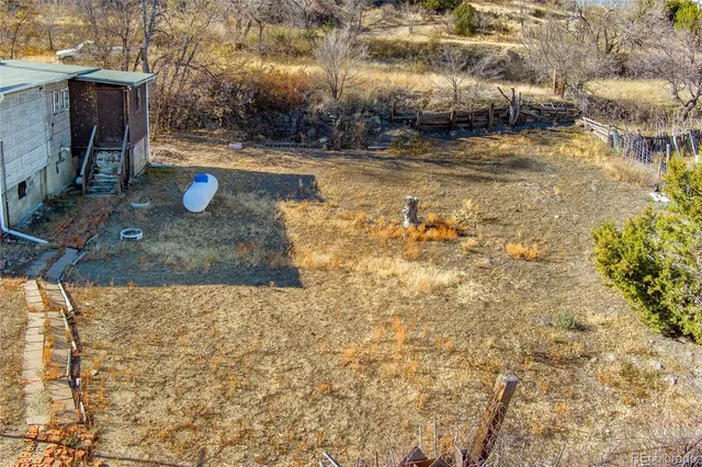 a view of swimming pool from a yard