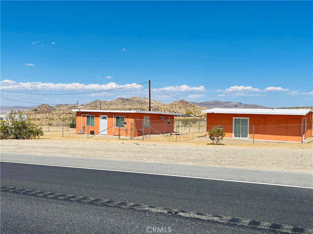 5827 Old Woman Springs Road Johnson Valley, CA 92285 - Photo 1 of 13 a view of a house with a ocean view