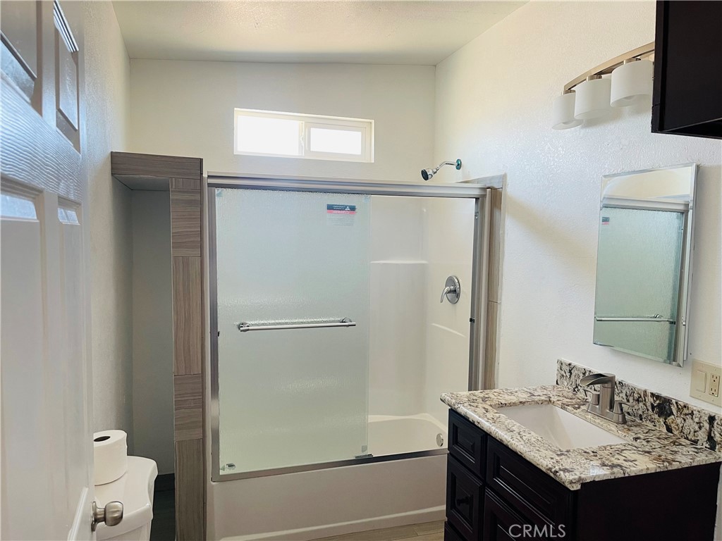 5827 Old Woman Springs Road Johnson Valley, CA 92285 - Photo 2 of 13 a bathroom with a sink and a mirror