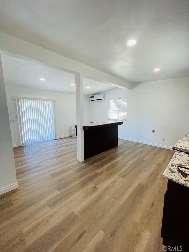 5827 Old Woman Springs Road Johnson Valley, CA 92285 - Photo 3 of 13 a view of empty room with wooden floor