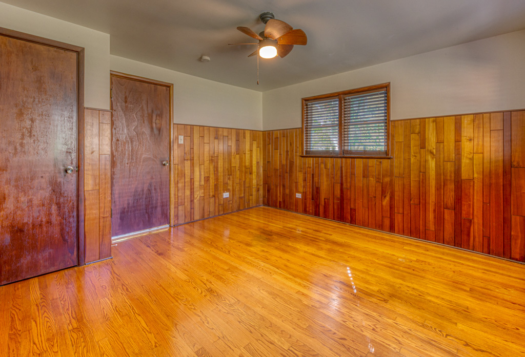 307 North Lake Street Gary, IN 46403 - Photo 27 of 38 a view of an empty room with window and ceiling fan
