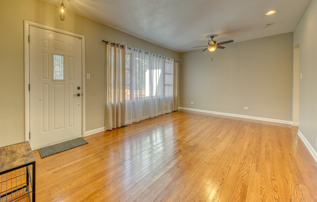 307 North Lake Street Gary, IN 46403 - Photo 29 of 38 wooden floor in an empty room with a window