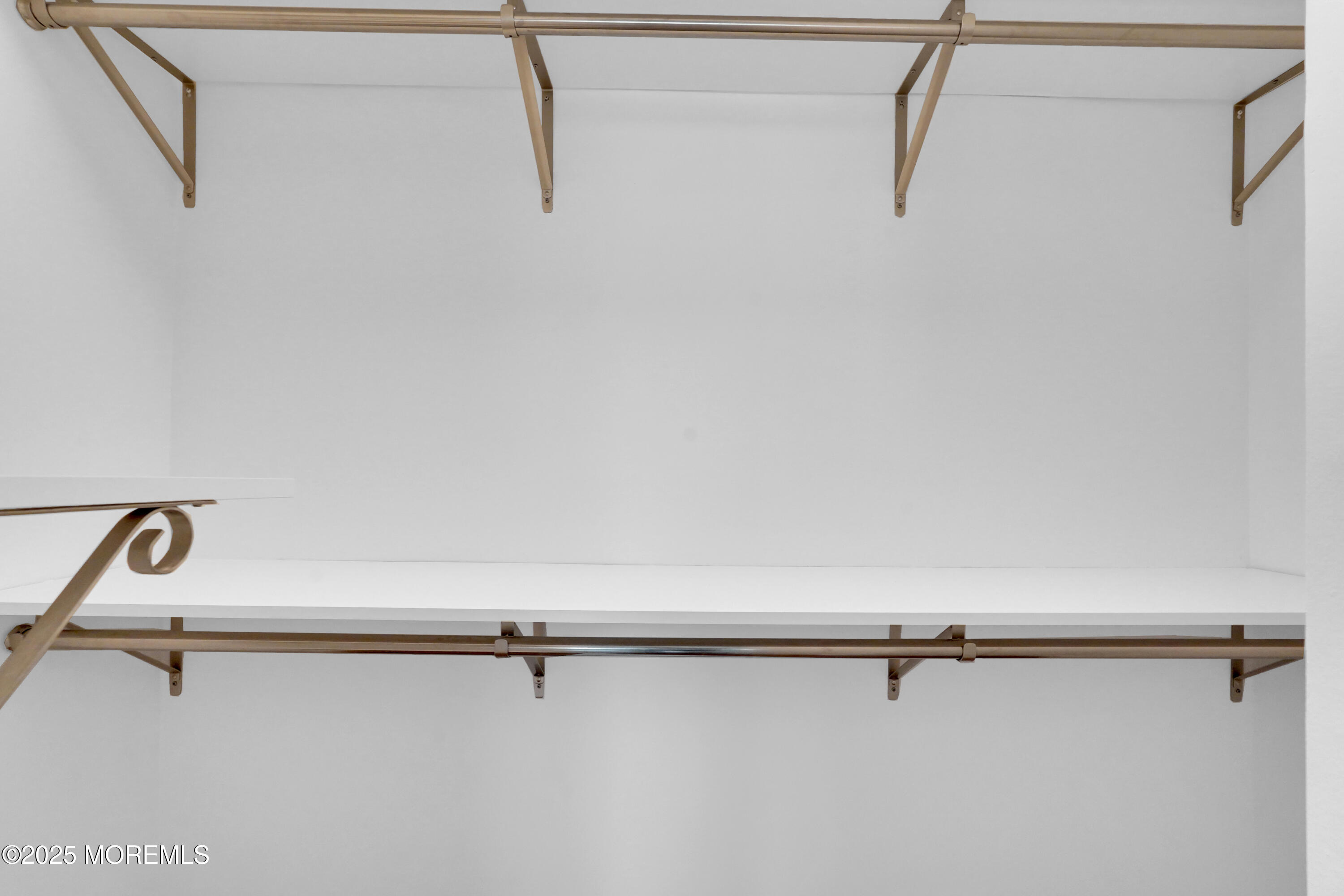 28 Riverside Avenue, Unit 5J Red Bank, NJ 07701 - Photo 23 of 35 a view of a room with racks on the wall