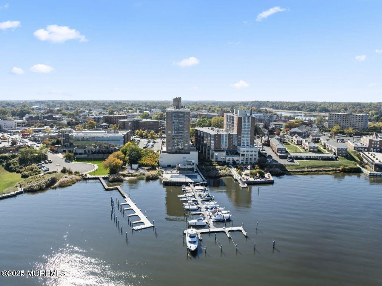 28 Riverside Avenue, Unit 5J Red Bank, NJ 07701 - Photo 28 of 35 a view of a terrace with chairs