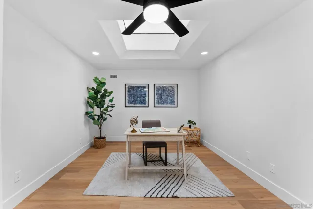 a workspace with furniture and rug