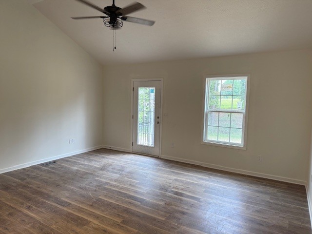 22 Ghea Road Normandy, TN 37360 - Photo 17 of 40 an empty room with wooden floor fan and windows