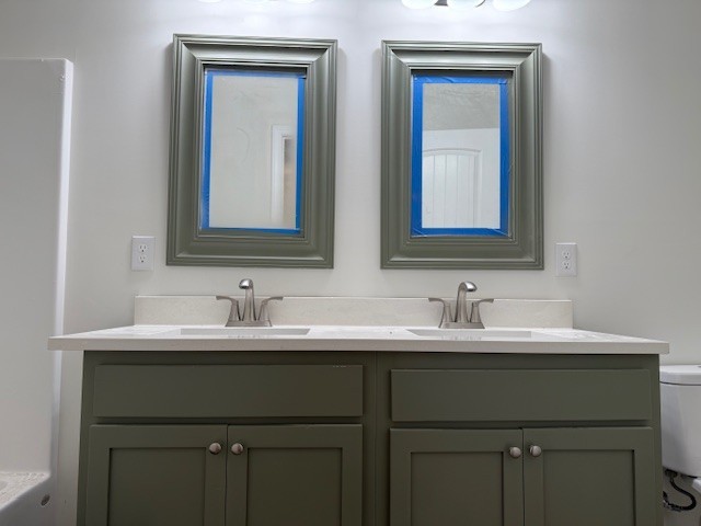 22 Ghea Road Normandy, TN 37360 - Photo 21 of 40 a bathroom with 2 sink and a mirror