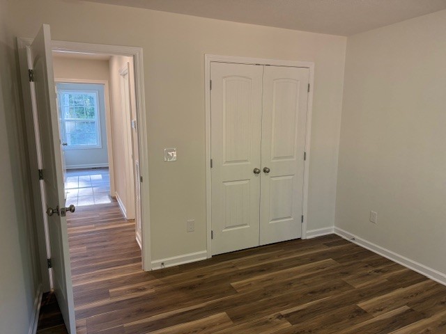 22 Ghea Road Normandy, TN 37360 - Photo 27 of 40 a view of a hallway with wooden floor and closet area