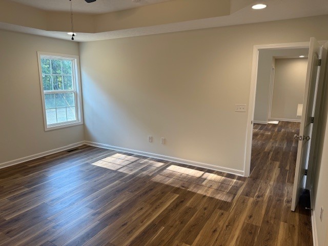 22 Ghea Road Normandy, TN 37360 - Photo 36 of 40 a view of empty room with wooden floor and fan