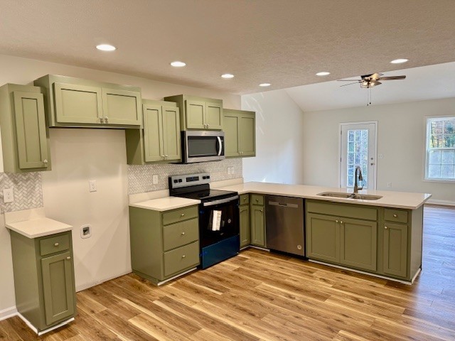 22 Ghea Road Normandy, TN 37360 - Photo 6 of 40 a kitchen with stainless steel appliances granite countertop a sink stove and refrigerator