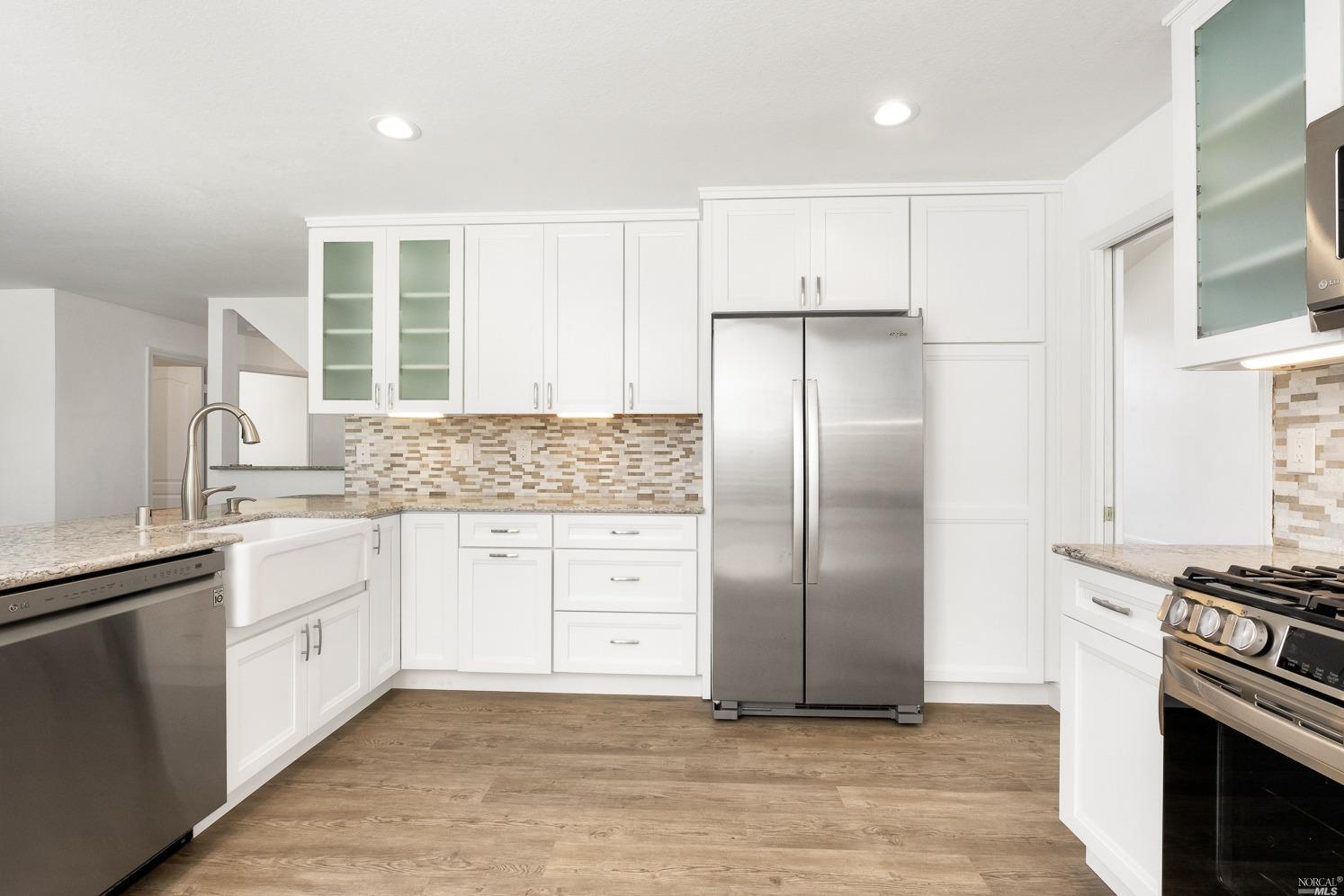 7216 Roxanne Lane Rohnert Park, CA 94928 - Photo 12 of 40 a kitchen with a refrigerator stove and sink