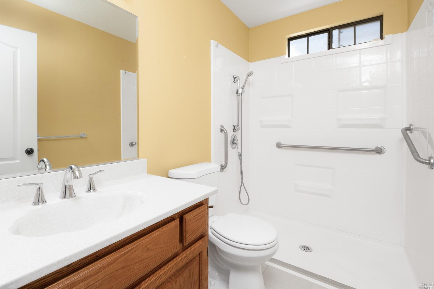 7216 Roxanne Lane Rohnert Park, CA 94928 - Photo 18 of 40 a bathroom with a sink a toilet and shower