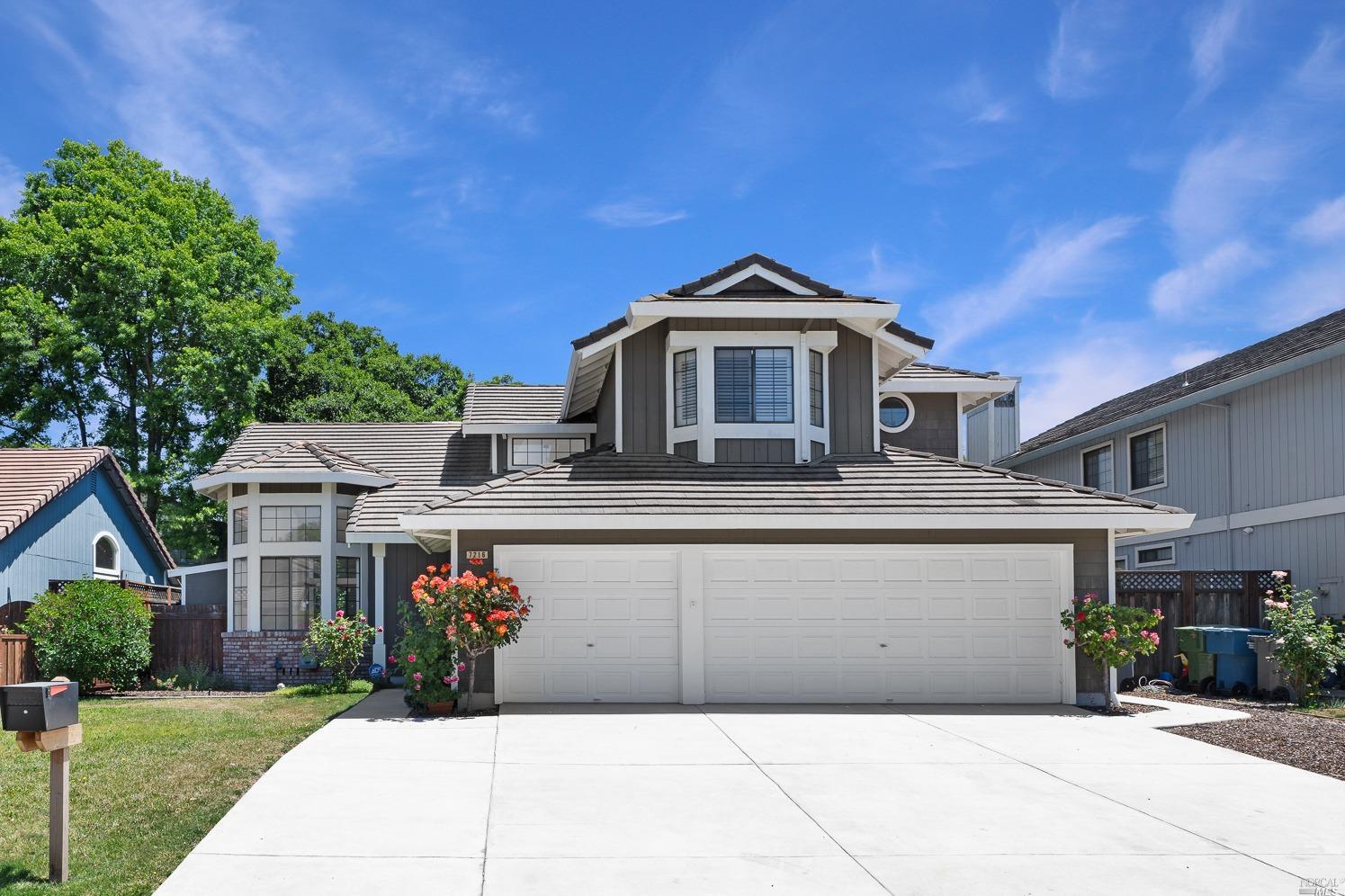 7216 Roxanne Lane Rohnert Park, CA 94928 - Photo 2 of 40 a front view of a house with a yard