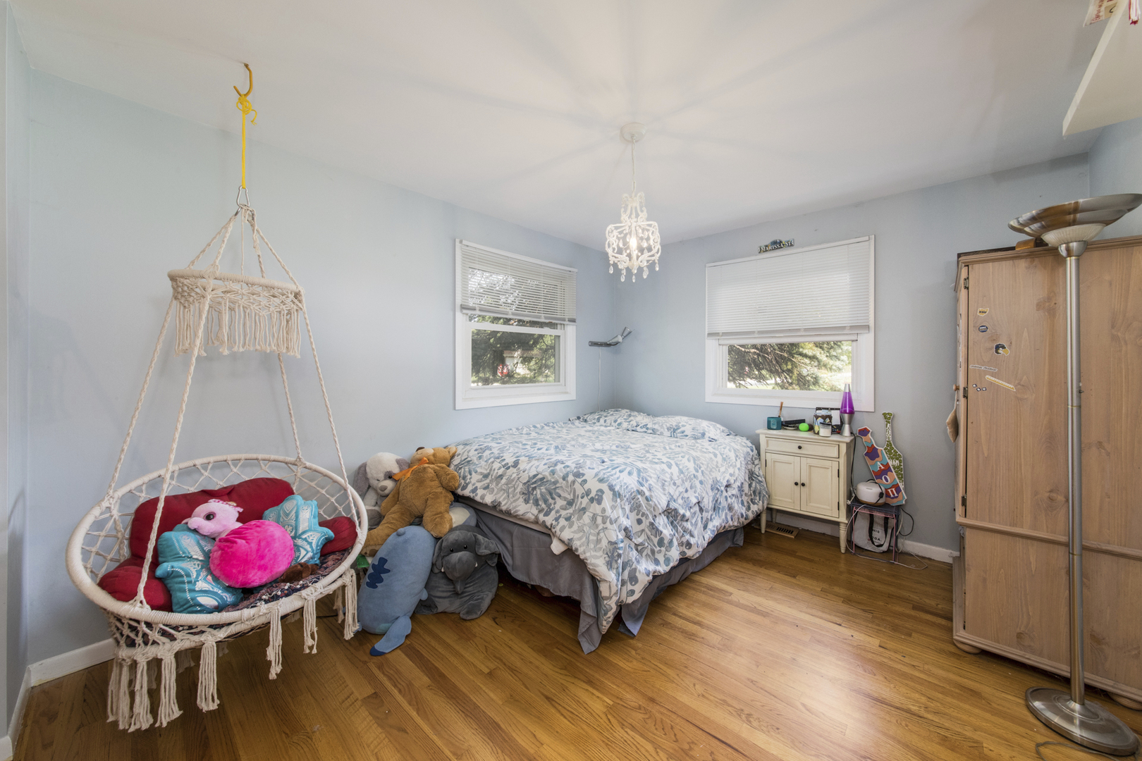 1901 Manor Lane Park Ridge, IL 60068 - Photo 13 of 18 a bedroom with a bed and wooden floor