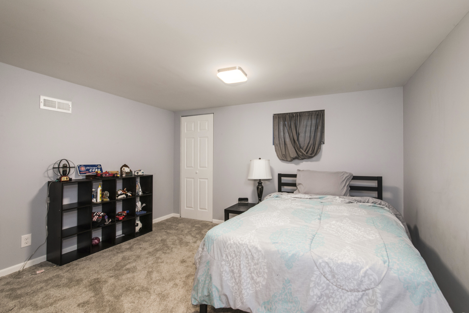 1901 Manor Lane Park Ridge, IL 60068 - Photo 16 of 18 a bed room with a bed and a lamp