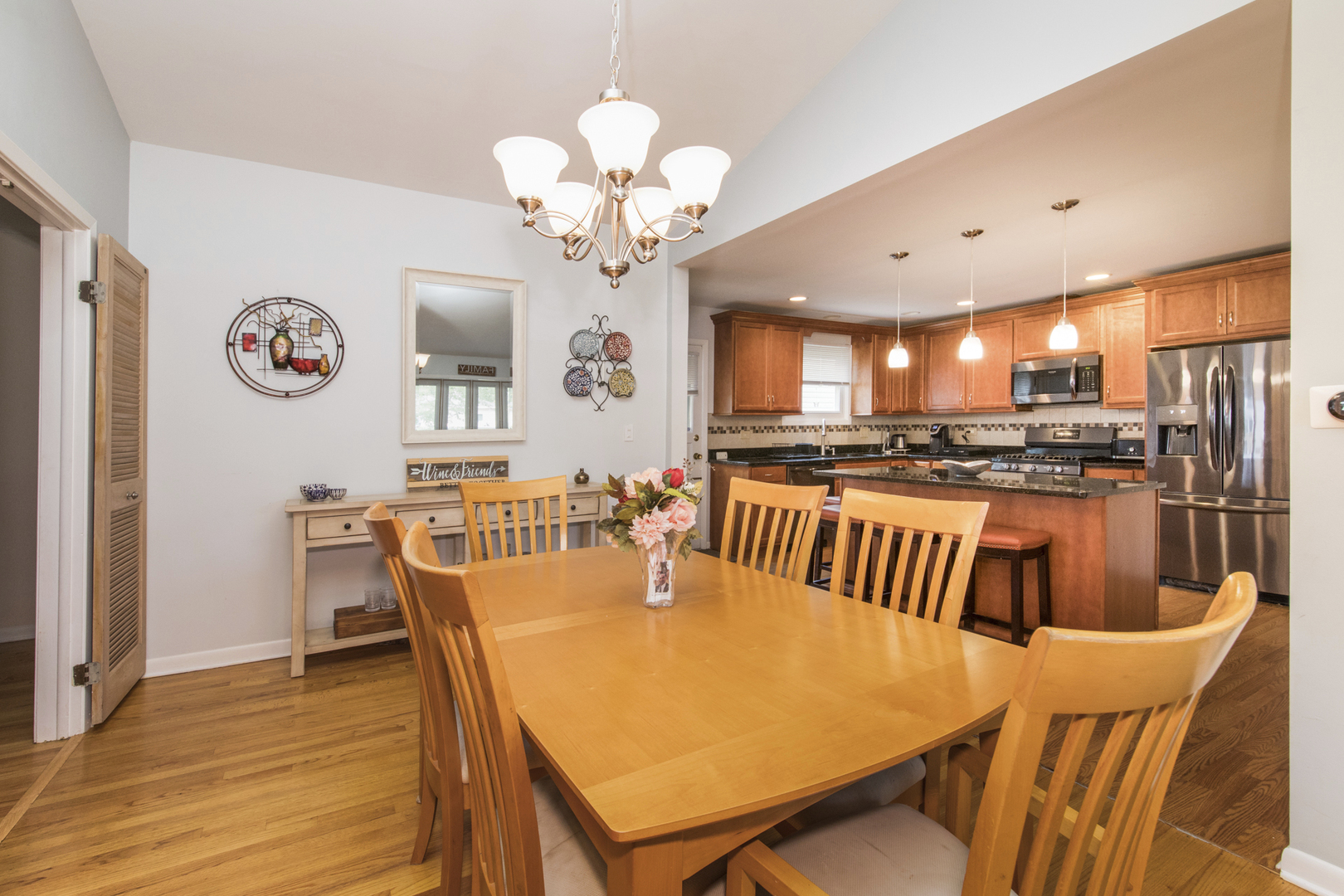 1901 Manor Lane Park Ridge, IL 60068 - Photo 6 of 18 a view of a dining room with furniture and wooden floor