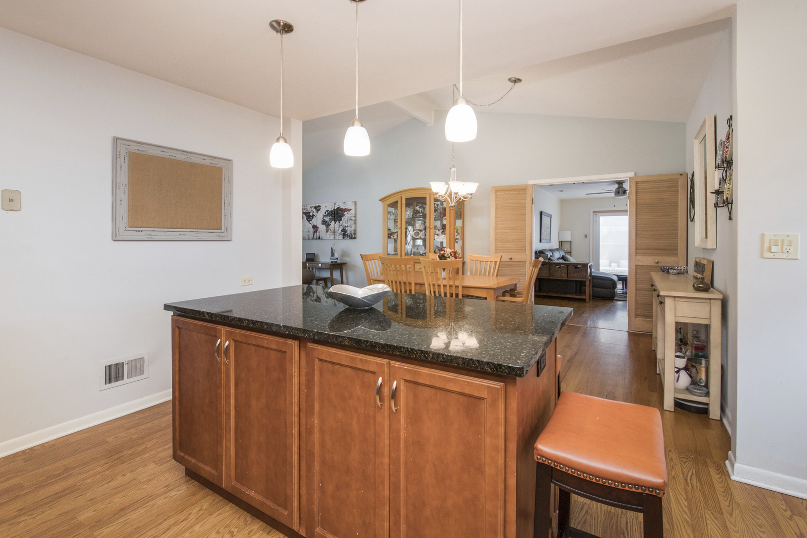1901 Manor Lane Park Ridge, IL 60068 - Photo 9 of 18 a kitchen with stainless steel appliances granite countertop a sink a stove and a wooden floors
