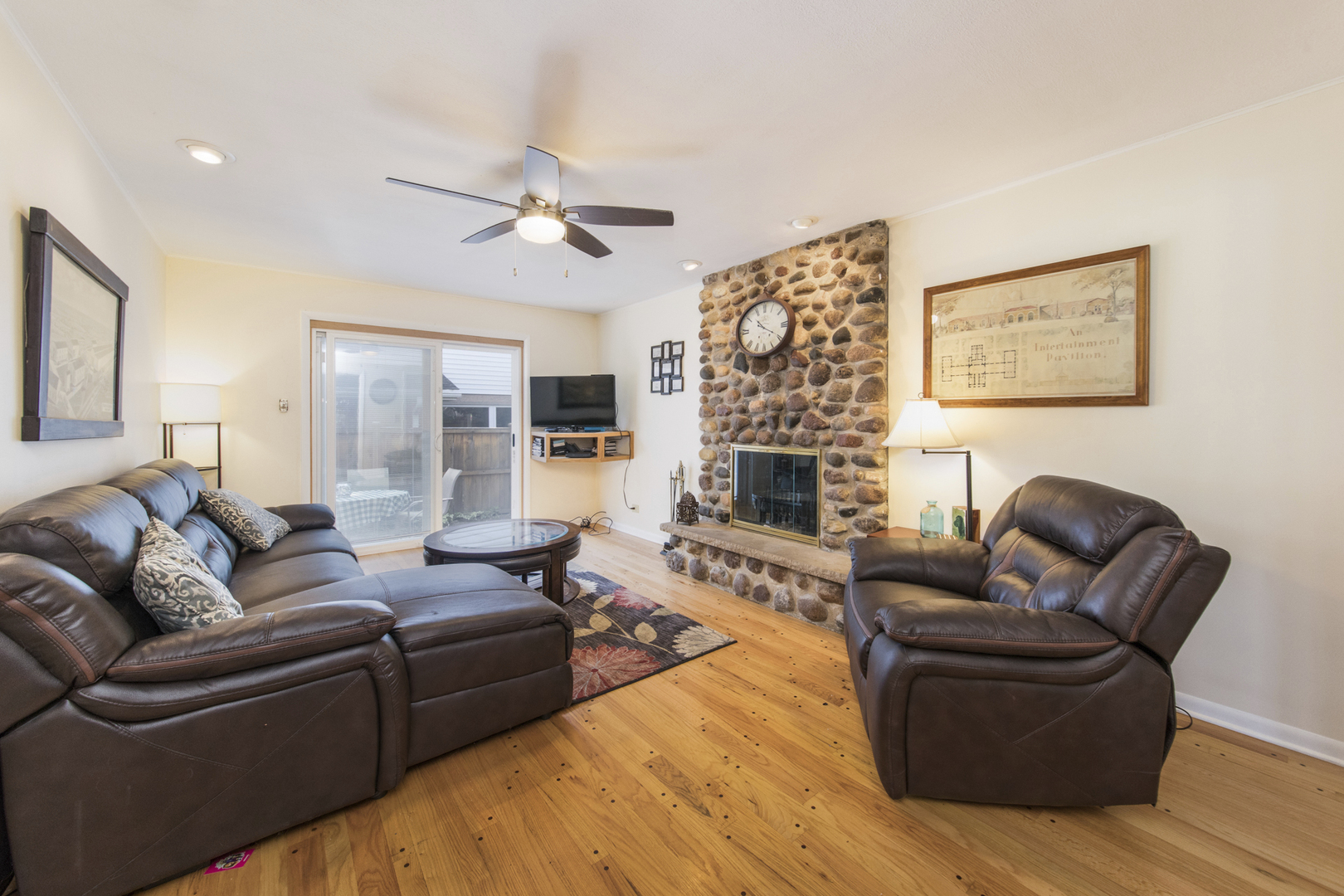 1901 Manor Lane Park Ridge, IL 60068 - Photo 10 of 18 a living room with furniture and a fireplace