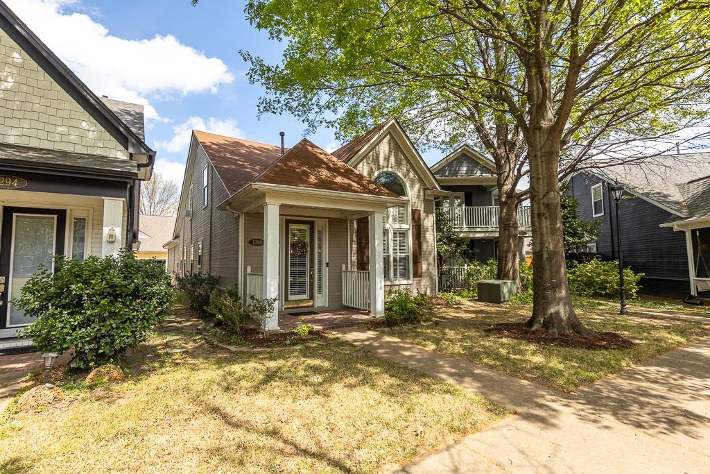1290 Isle Pointe Drive Memphis, TN 38103 - Photo 28 of 30 a front view of a house with a tree in front