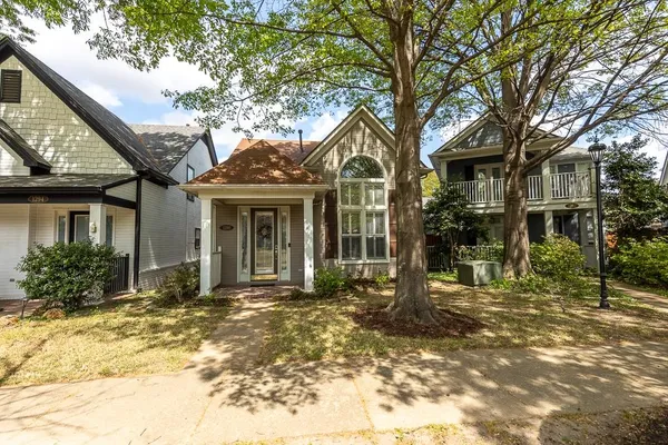 a front view of a house with a porch