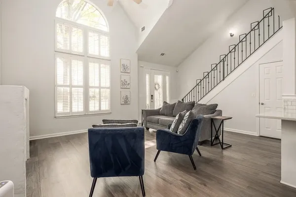 a living room with furniture and a window
