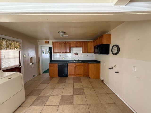 3714 Christie Street Houston, TX 77026 - Photo 22 of 24 a large kitchen with kitchen island granite countertop a sink and a white cabinets