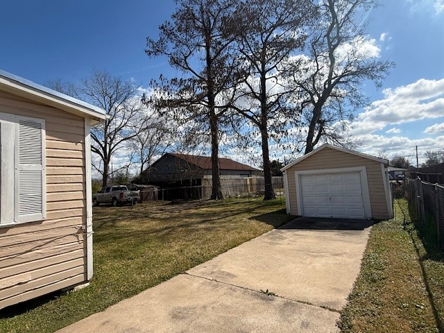 3714 Christie Street Houston, TX 77026 - Photo 7 of 24 a front view of a house with a yard and garage