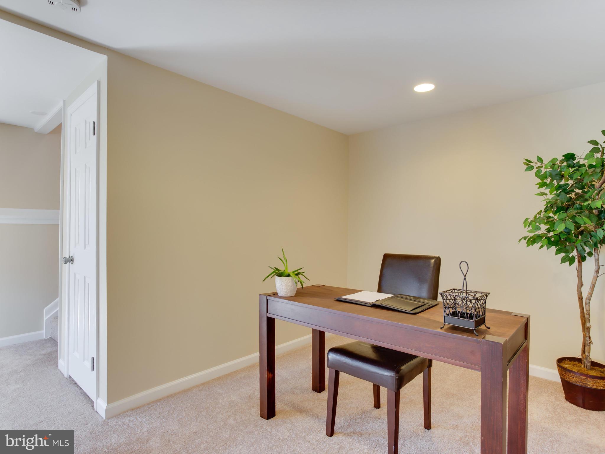 1925 Grant Road Baltimore, MD 21227 - Photo 18 of 44 a view of a workspace with furniture