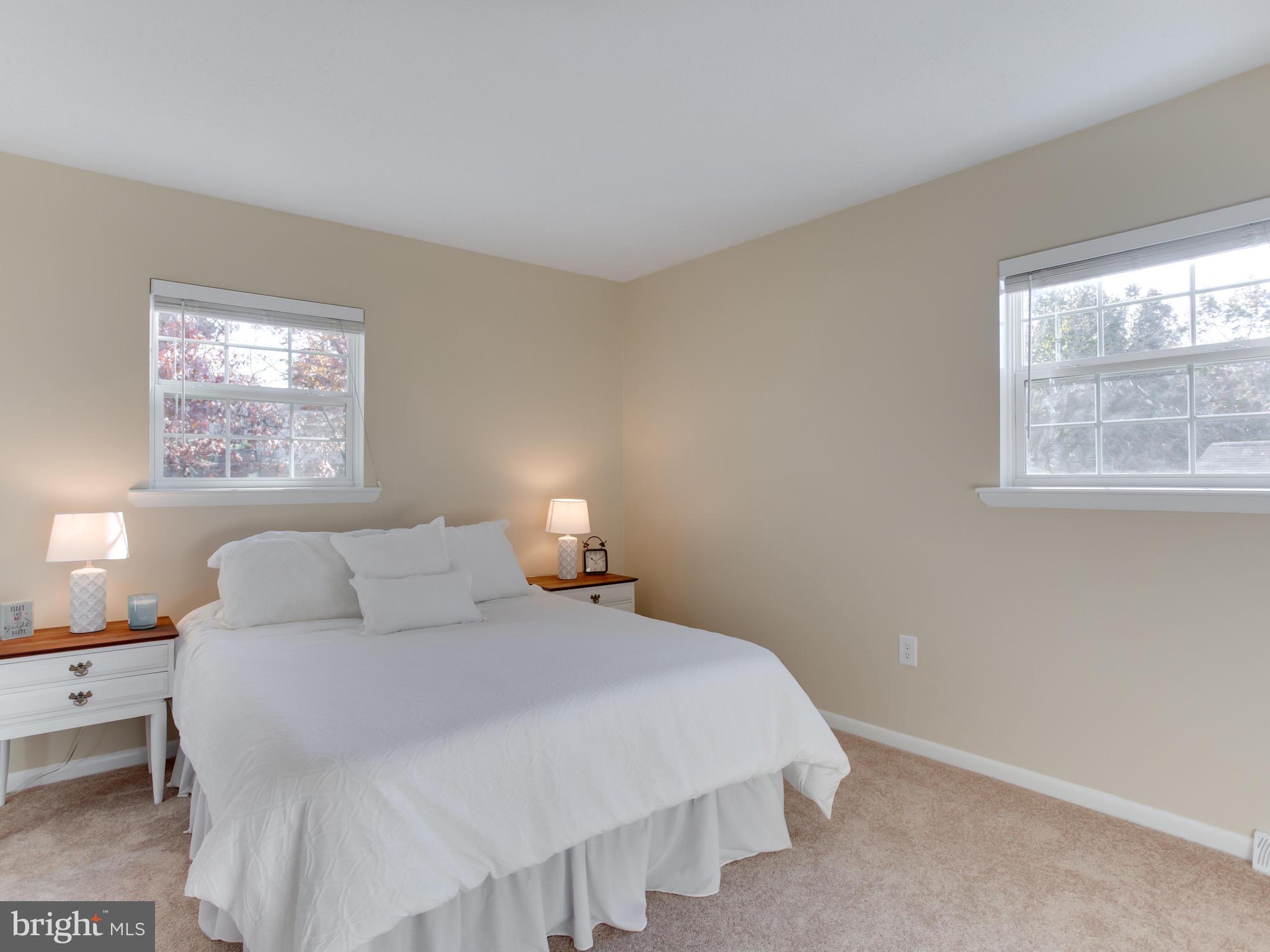 1925 Grant Road Baltimore, MD 21227 - Photo 21 of 44 a bedroom with a bed and a window