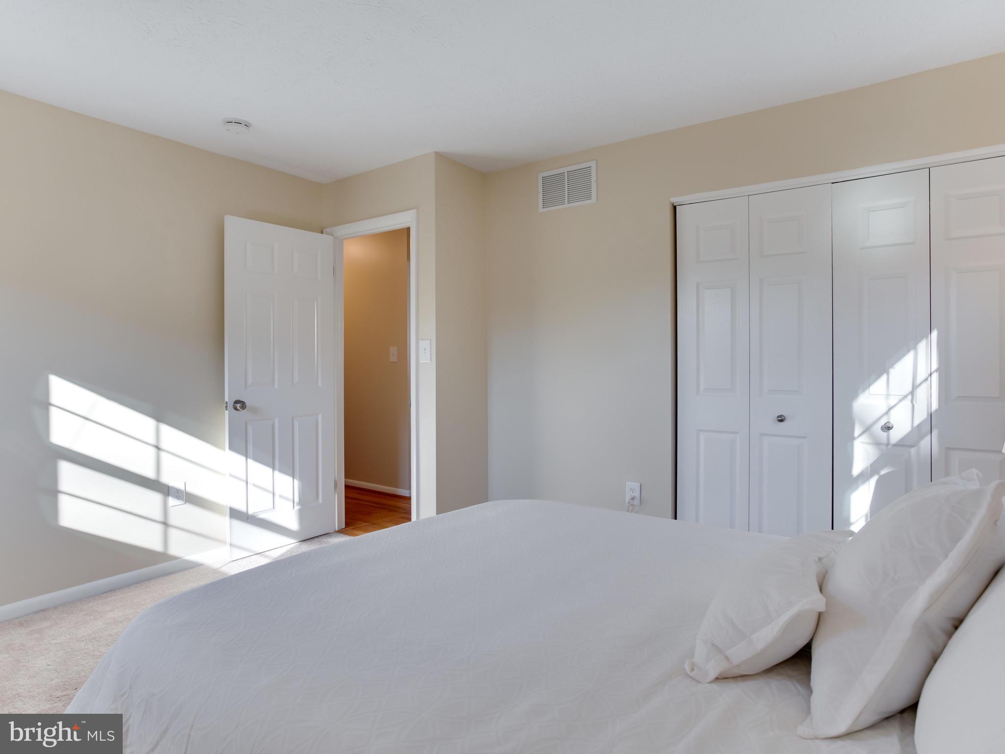 1925 Grant Road Baltimore, MD 21227 - Photo 23 of 44 a bedroom with a bed and a window