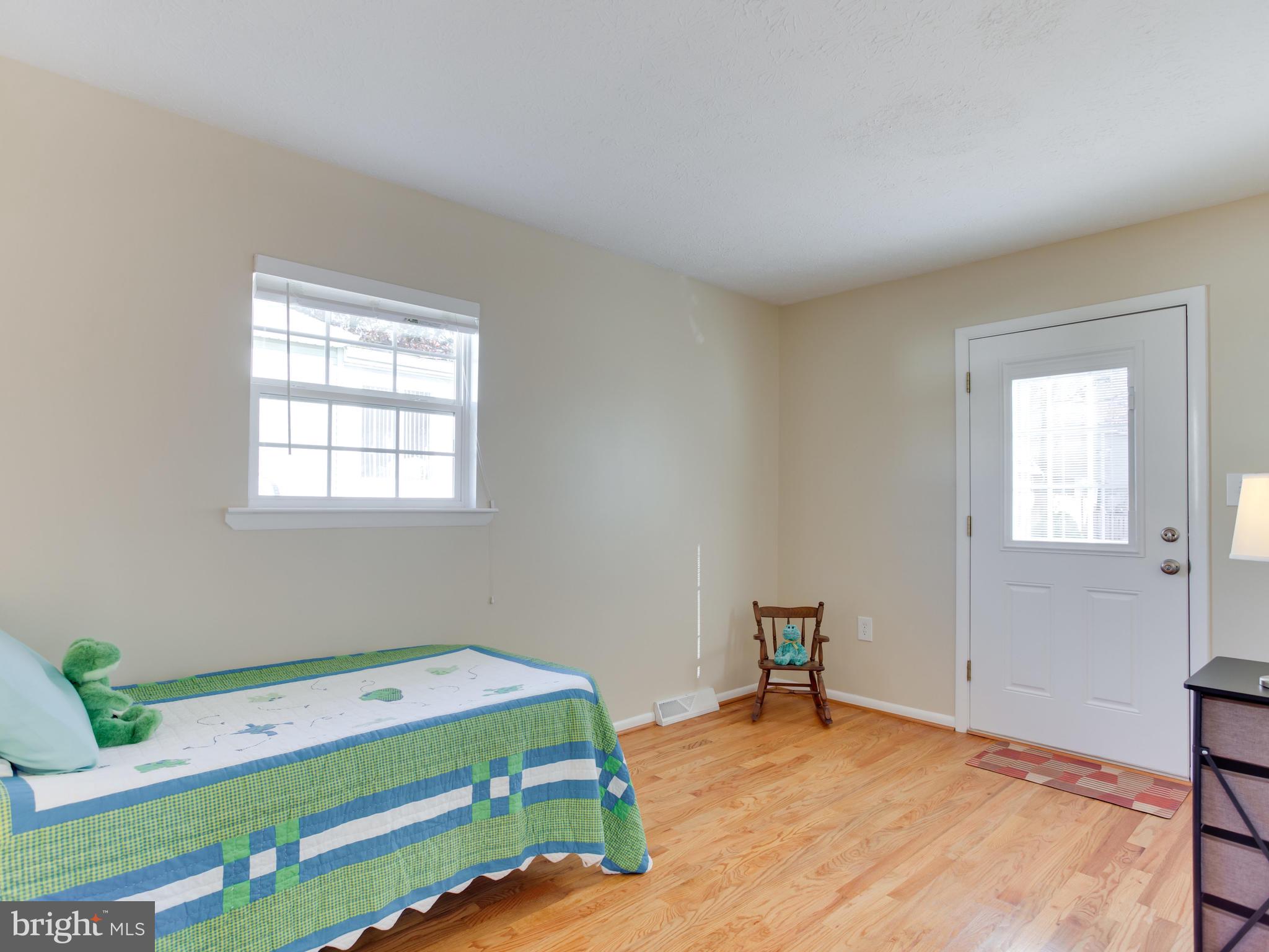 1925 Grant Road Baltimore, MD 21227 - Photo 26 of 44 a bedroom with a bed and a window