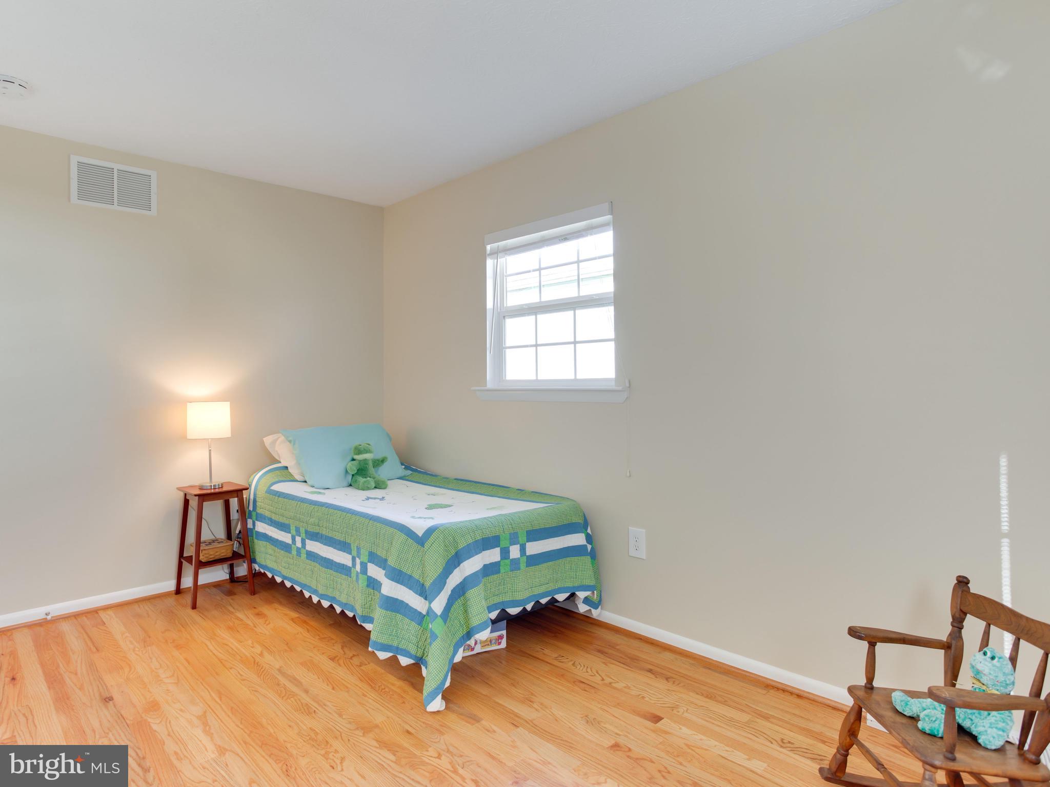 1925 Grant Road Baltimore, MD 21227 - Photo 27 of 44 a room with a bed and a table in it
