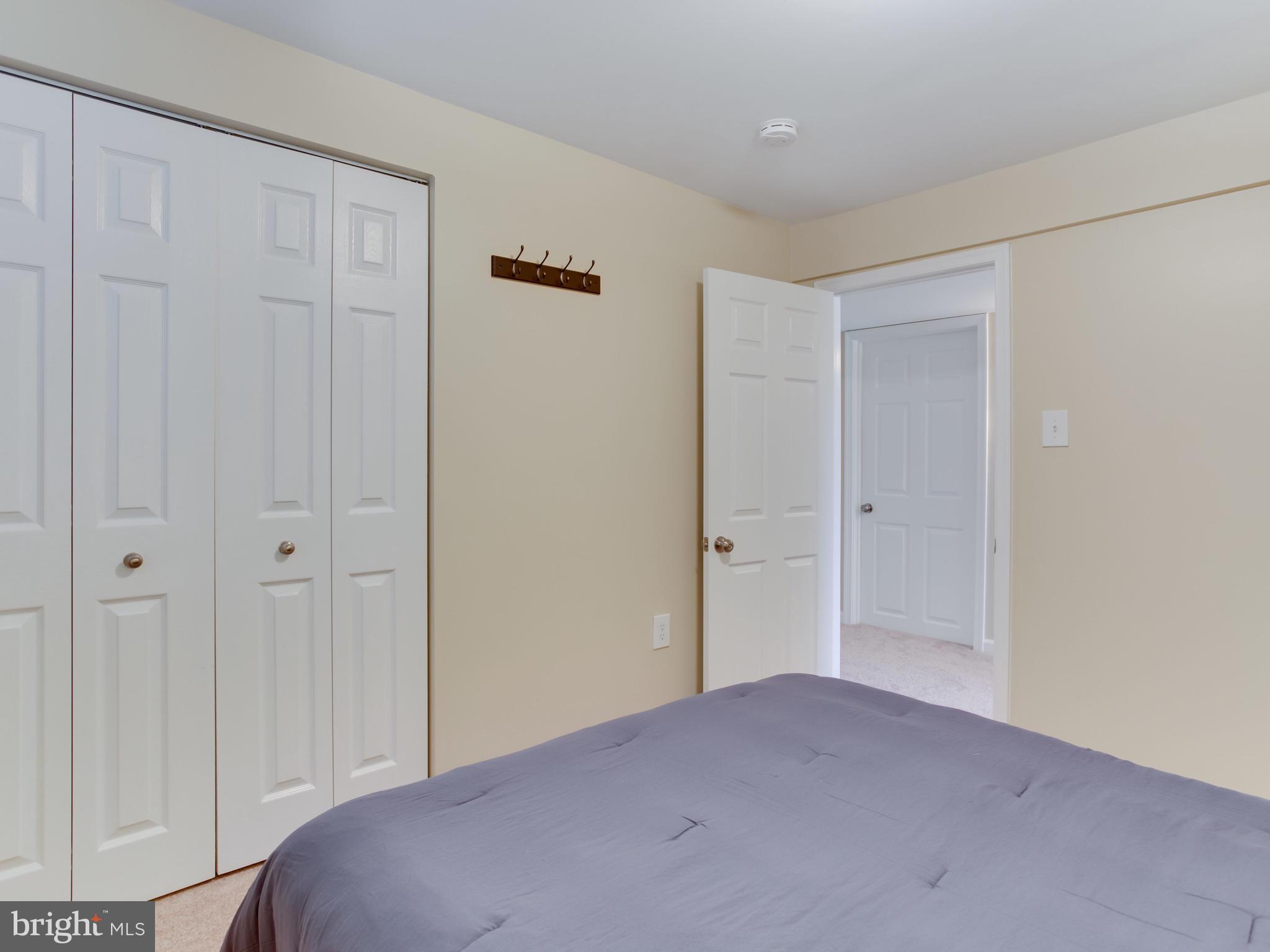 1925 Grant Road Baltimore, MD 21227 - Photo 34 of 44 a bedroom with a bed and a shower