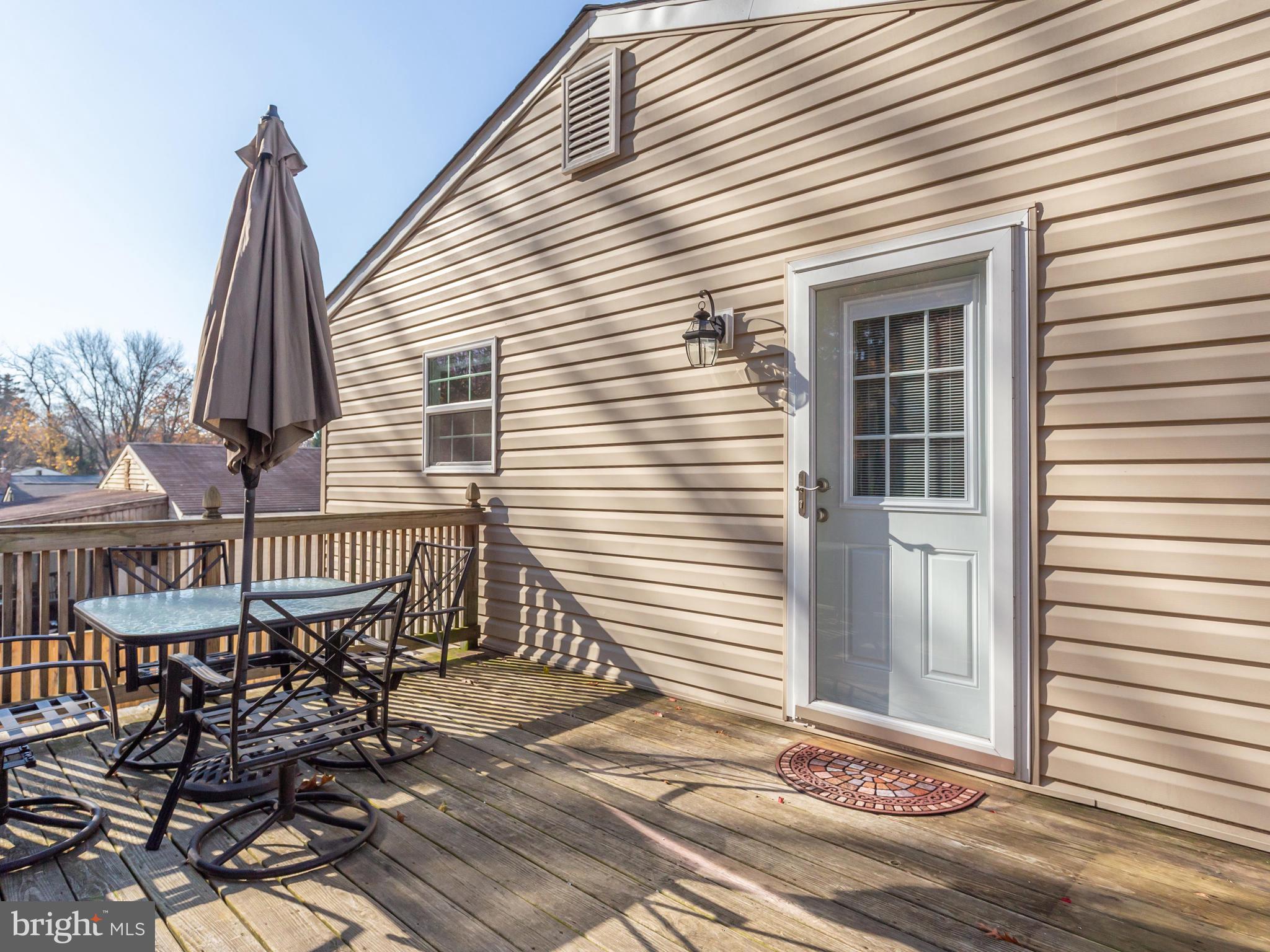 1925 Grant Road Baltimore, MD 21227 - Photo 39 of 44 a view of a patio with a table and chairs