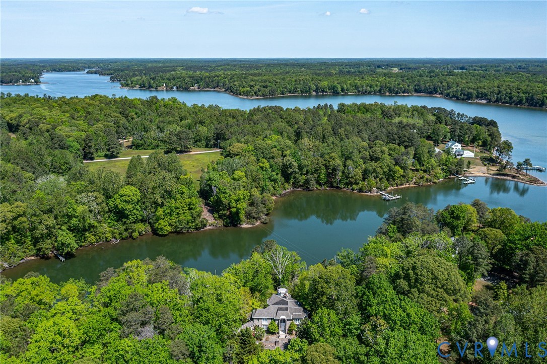 Expansive waterfront property featuring a substant