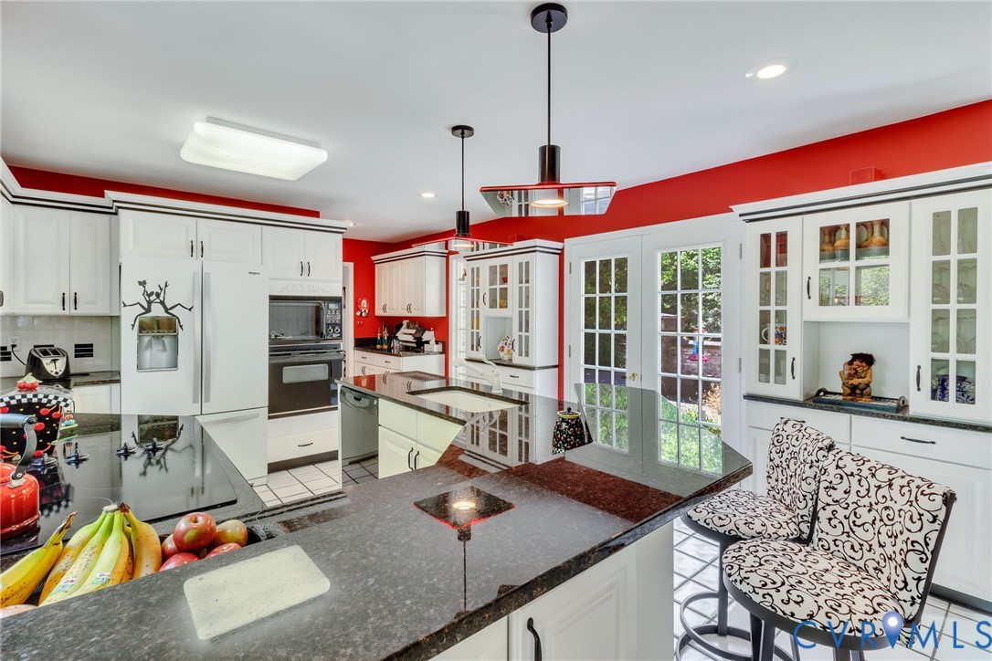 1167 Ottoman Ferry Road Lancaster, VA 22503 - Photo 18 of 52 Spacious kitchen featuring extensive black granite