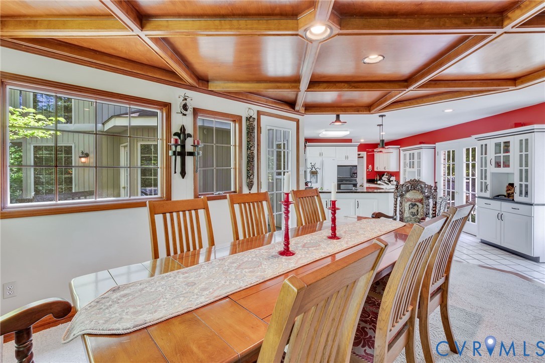 1167 Ottoman Ferry Road Lancaster, VA 22503 - Photo 20 of 52 Spacious dining area featuring a coffered wood-fin