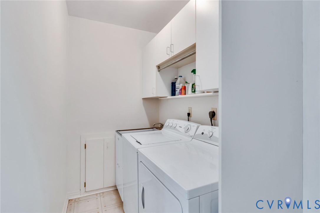 1167 Ottoman Ferry Road Lancaster, VA 22503 - Photo 28 of 52 Dedicated laundry area featuring a full-size washe