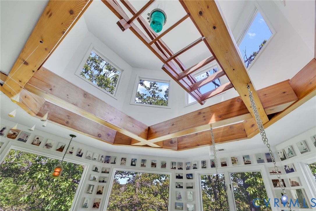 1167 Ottoman Ferry Road Lancaster, VA 22503 - Photo 37 of 52 Vaulted ceiling with exposed wood beams, multiple