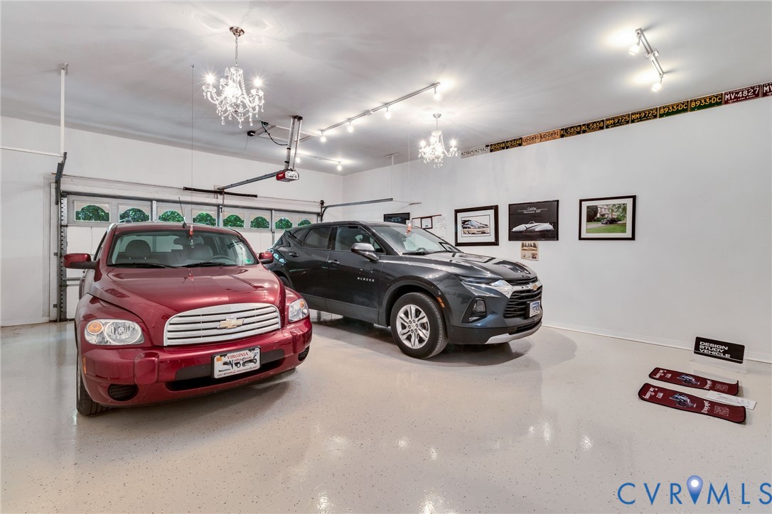 1167 Ottoman Ferry Road Lancaster, VA 22503 - Photo 43 of 52 Multi-car garage featuring a speckled epoxy floor
