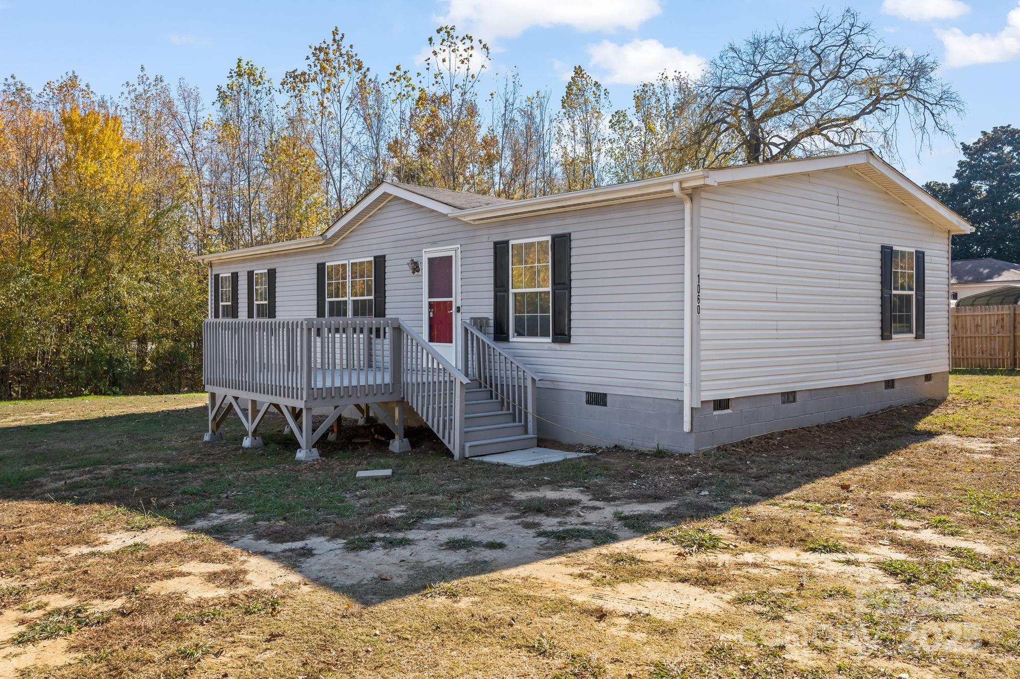 1060 Beckham Road Salisbury, NC 28147 - Photo 1 of 28 a view of a house with a yard