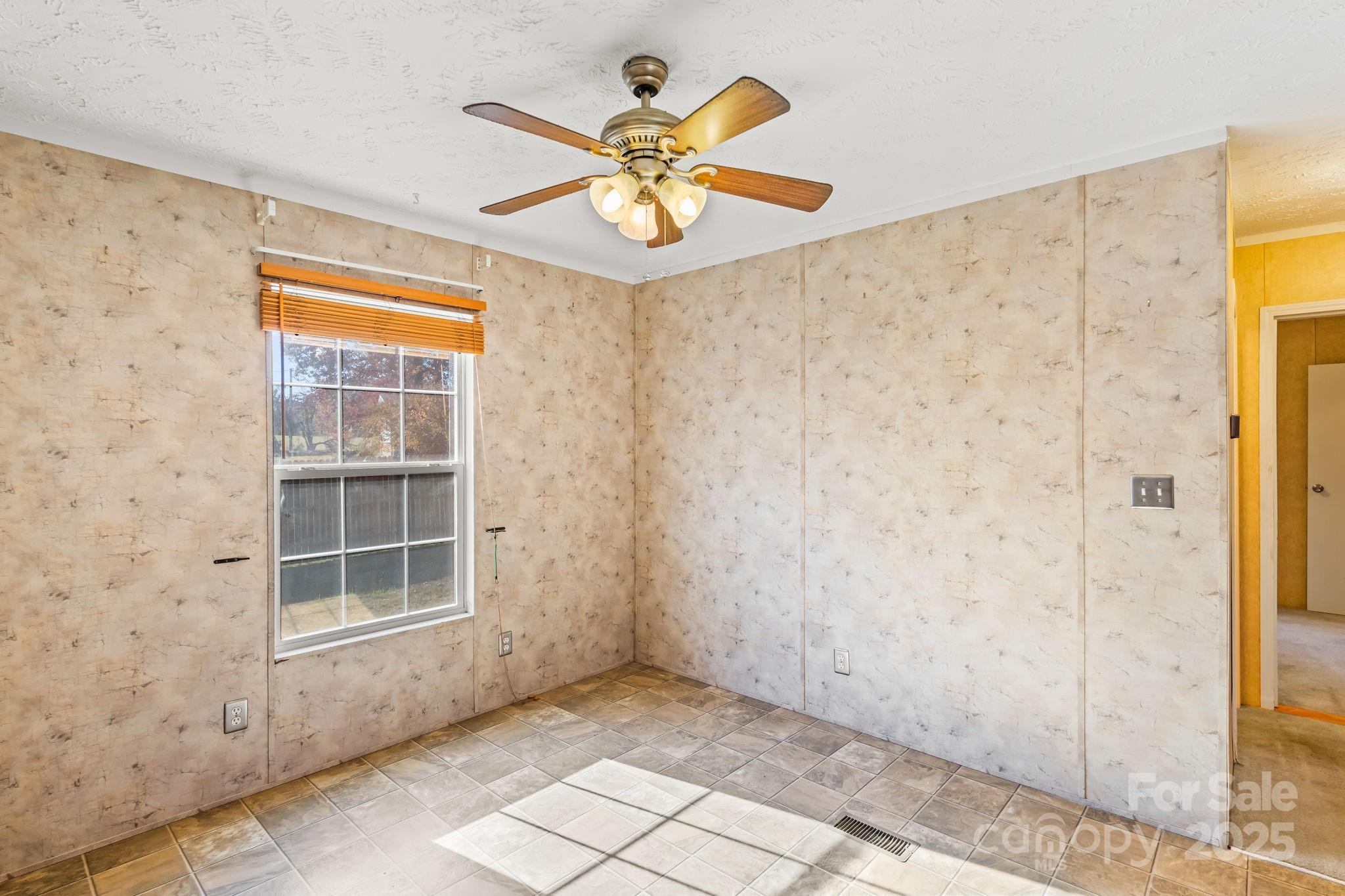 1060 Beckham Road Salisbury, NC 28147 - Photo 16 of 28 a view of an empty room with a window