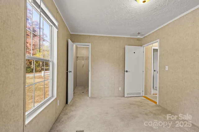 an empty room with windows