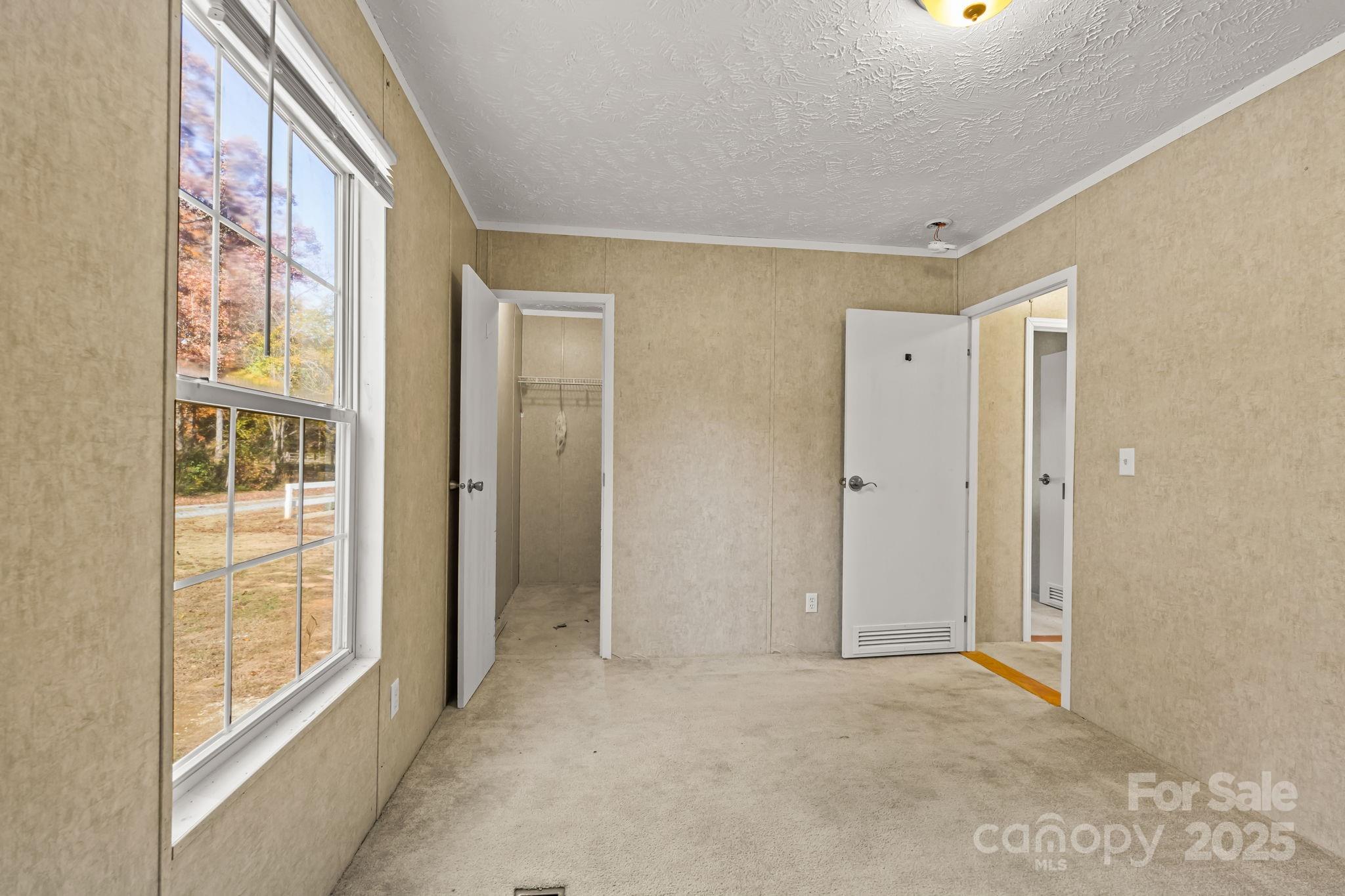 1060 Beckham Road Salisbury, NC 28147 - Photo 24 of 28 an empty room with windows