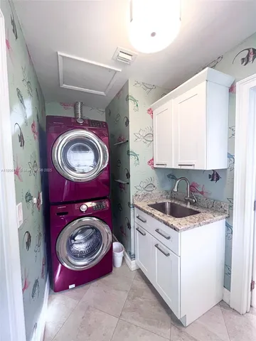 a view of washer and dryer in a utility room