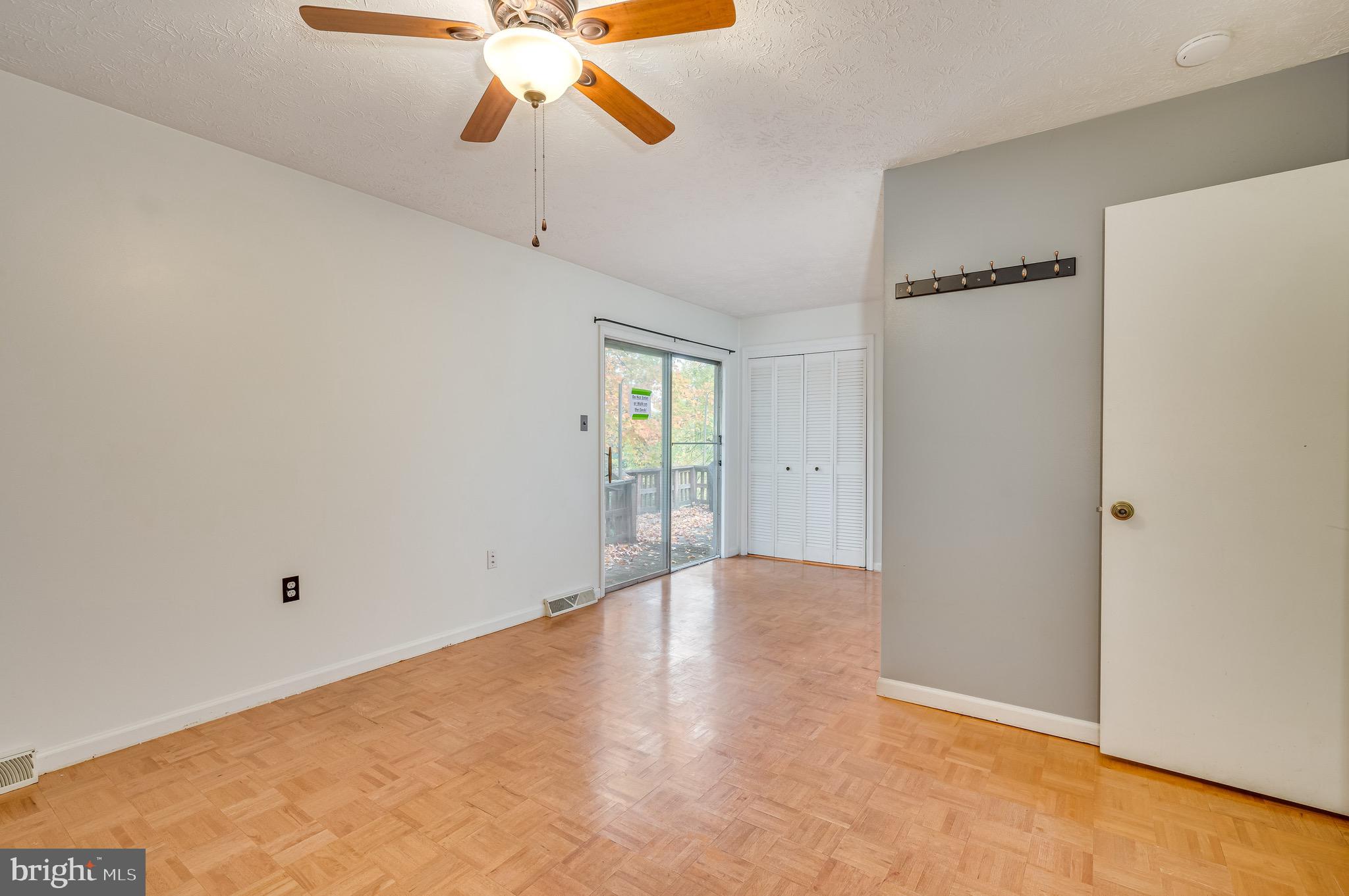 129 Longcroft Road Winchester, VA 22602 - Photo 33 of 37 Primary Bedroom with Deck access.